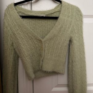 Green fuzzy/soft cardigan from garage. Only worn a few times. Great condition
